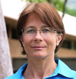 Monika, outside. She's wearing an aqua shirt.