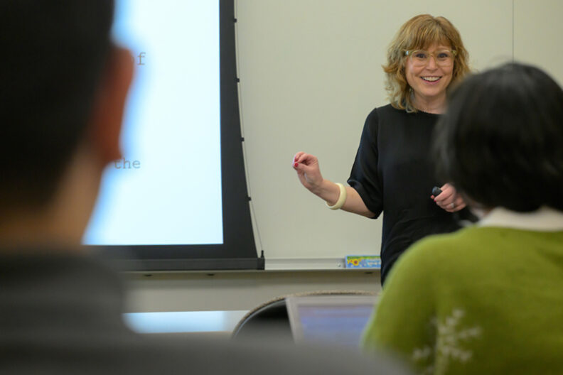 Dr. McBride presenting to students.