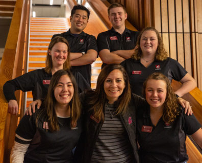 A group of students wearing matching black WSU shirts.