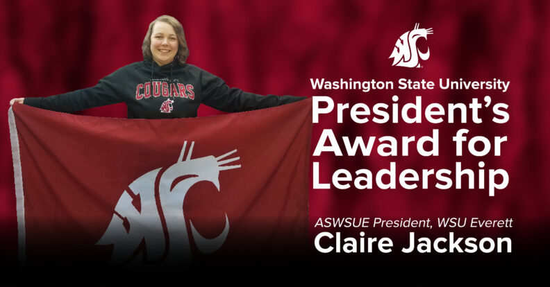 A person holding out a crimson flag with the WSU cougar head logo on it with the text President's Award for Leadership ASWSUE President, WSU Everett, Claire Jackson.
