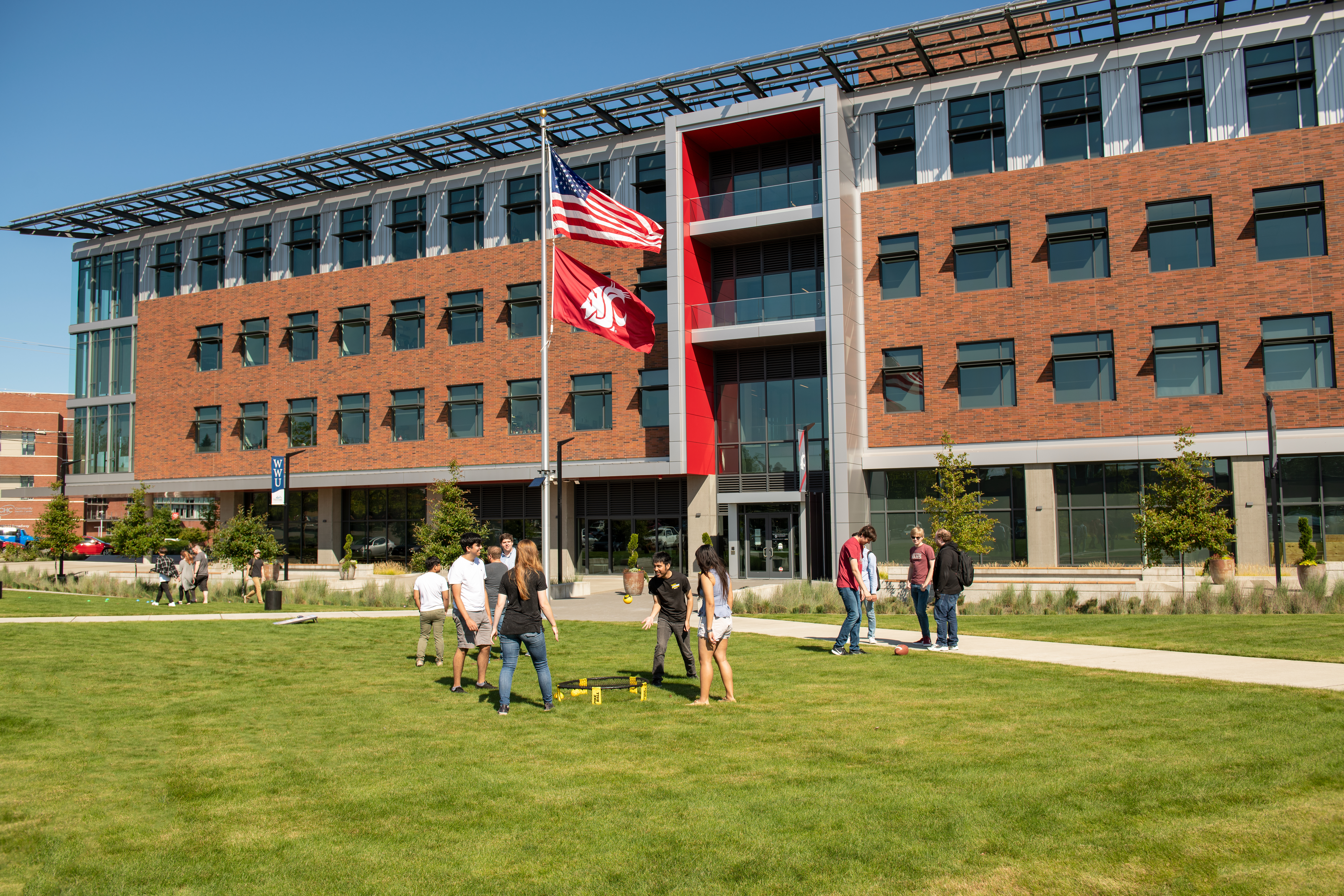 WSU Everett students play yard games outside on the Everett campus of Washington State University, Tuesday, August 27, 2019.