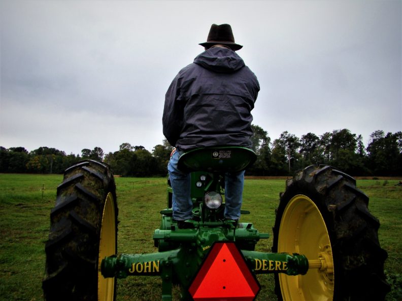Clallam County Farmer on Tractor
