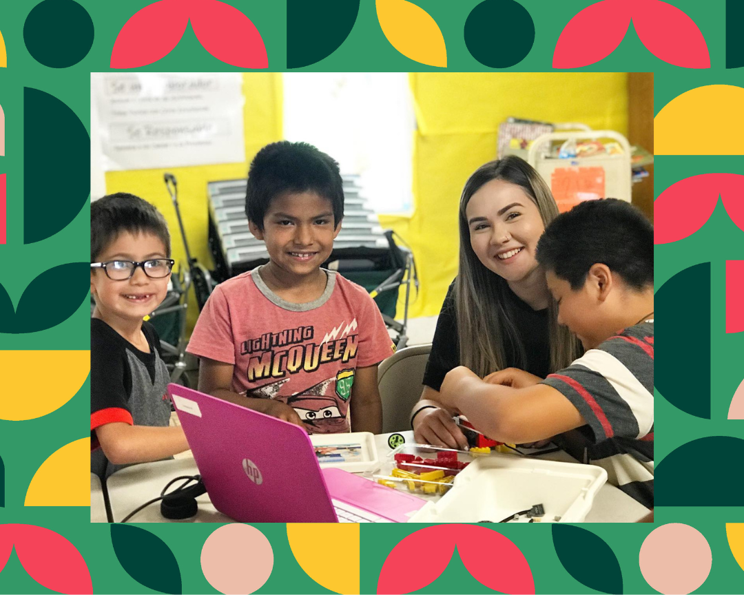 Group of 4-H youth learning robotics