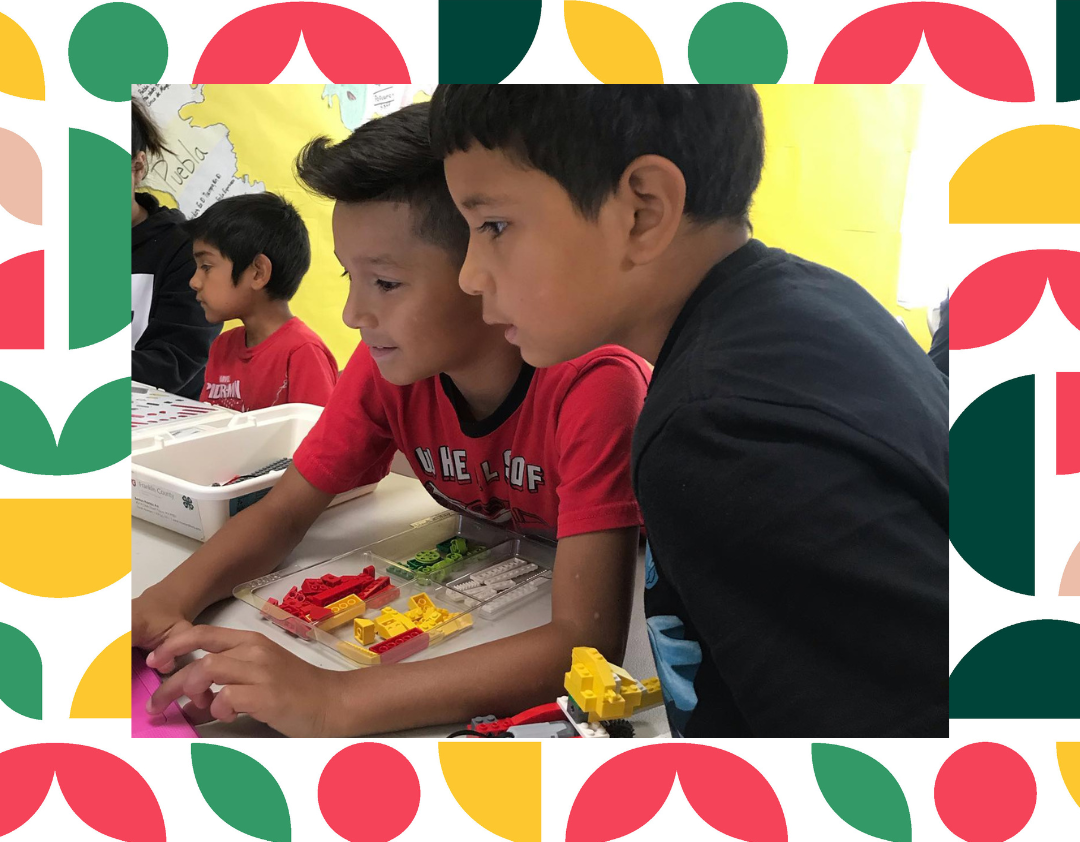 4-H youth learning lego robotics