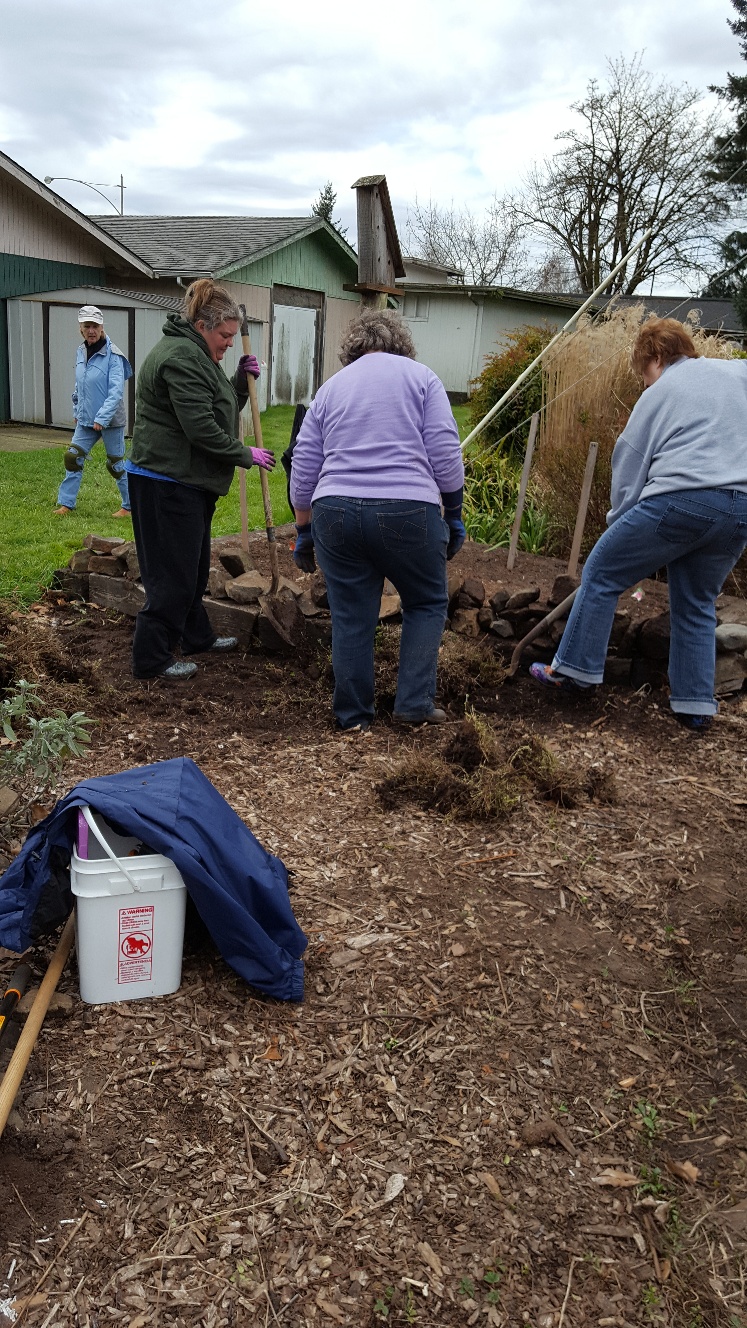 Master Gardener's working in the demo garden.