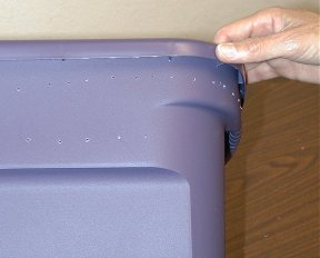 holes spaced out on bin edge