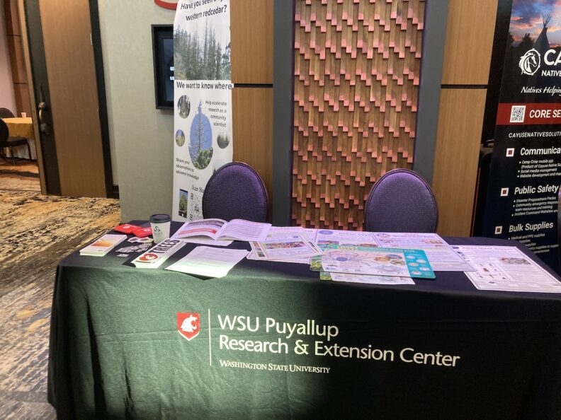 WSU INVASIVES booth at ATNI meeting in Tulalip