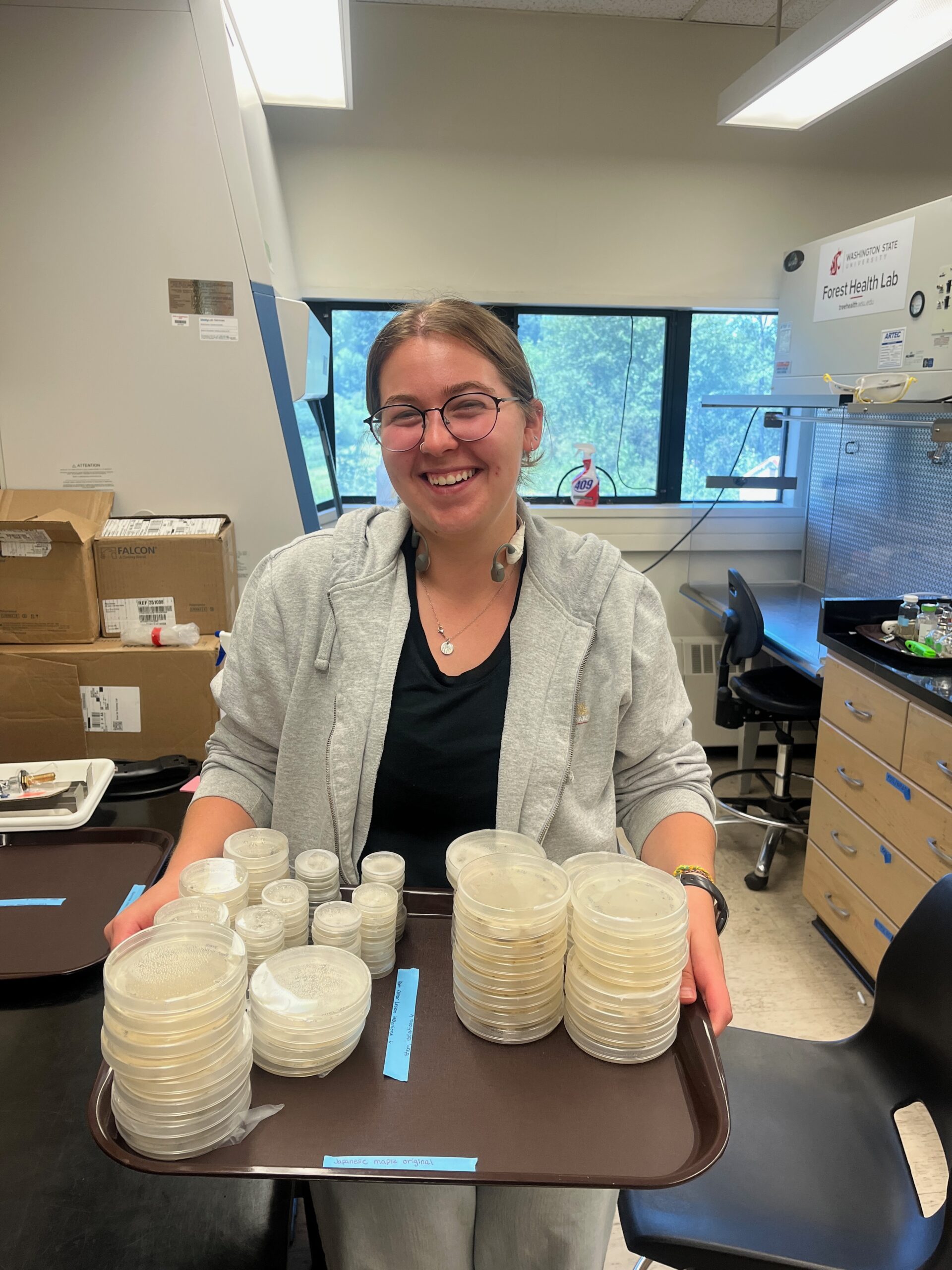Naomi Wurtzel assisting with research in the lab