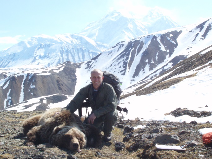 Justin Teisberg with grizzly bear.