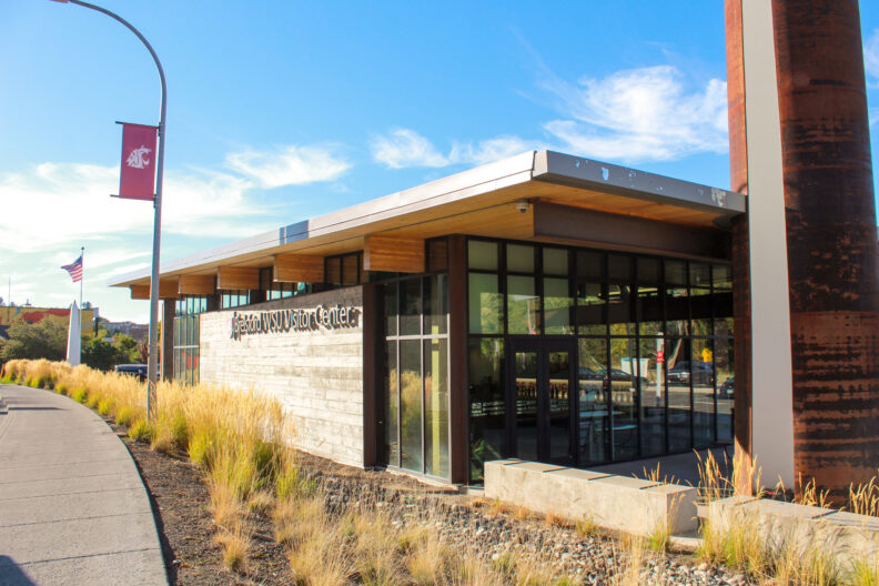 An image of the exterior of the Brelsford Washington State University Visitor Center from Main Street in Pullman, Washington.