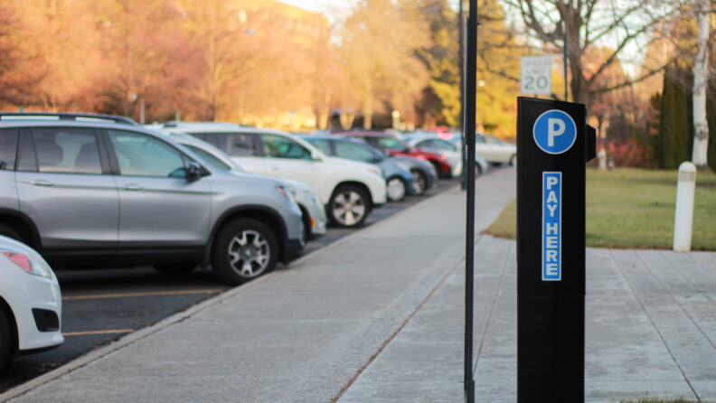 An image of a parking payment kiosk along street parking at the Washington State University Pullman campus.