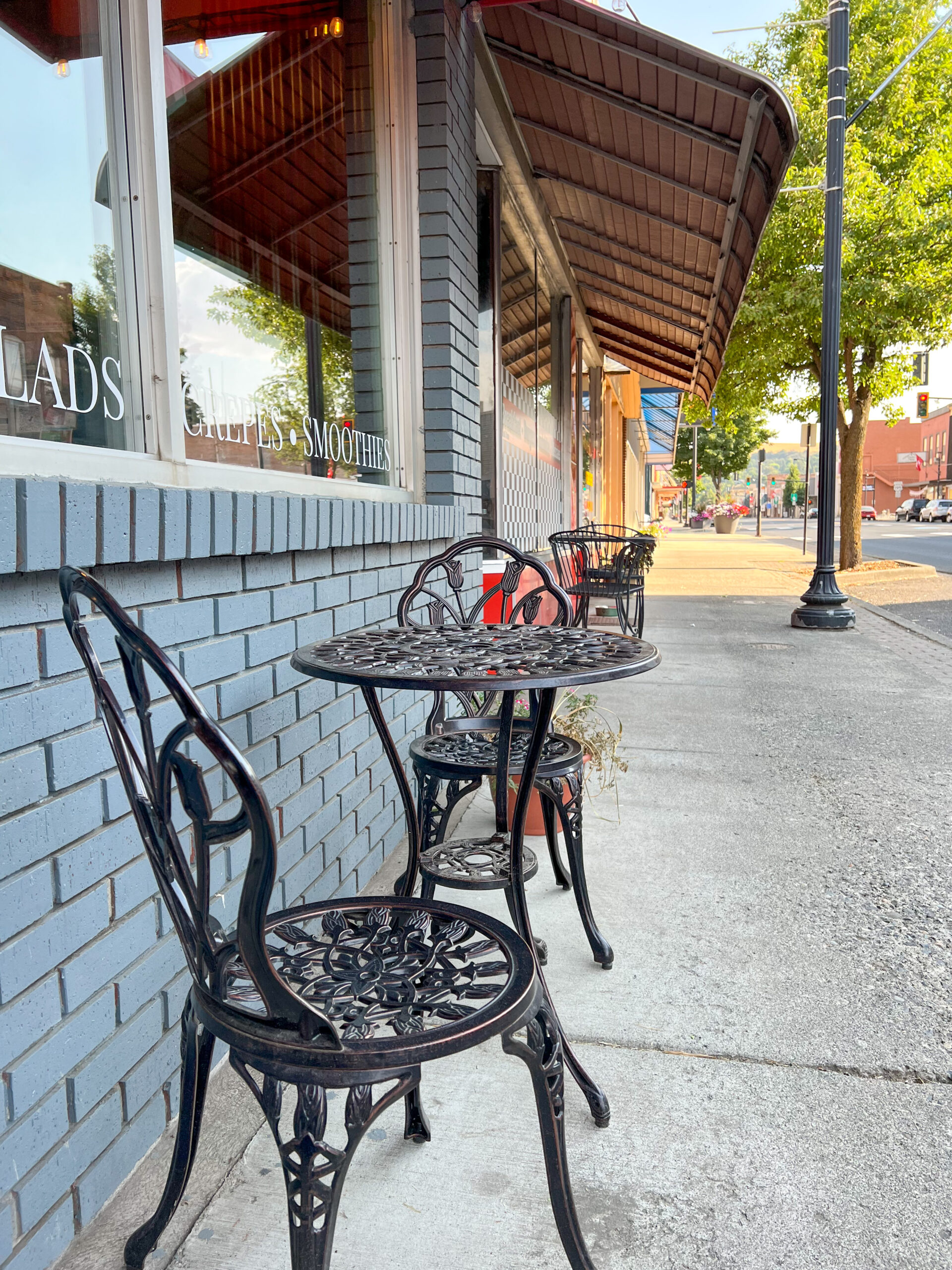 An image of outdoor seating along Main Street in downtown Colfax, Washington.
