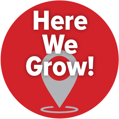Locator icon saying Here We Grow, indicating a click thru to a page sharing building projects for Washington State University
