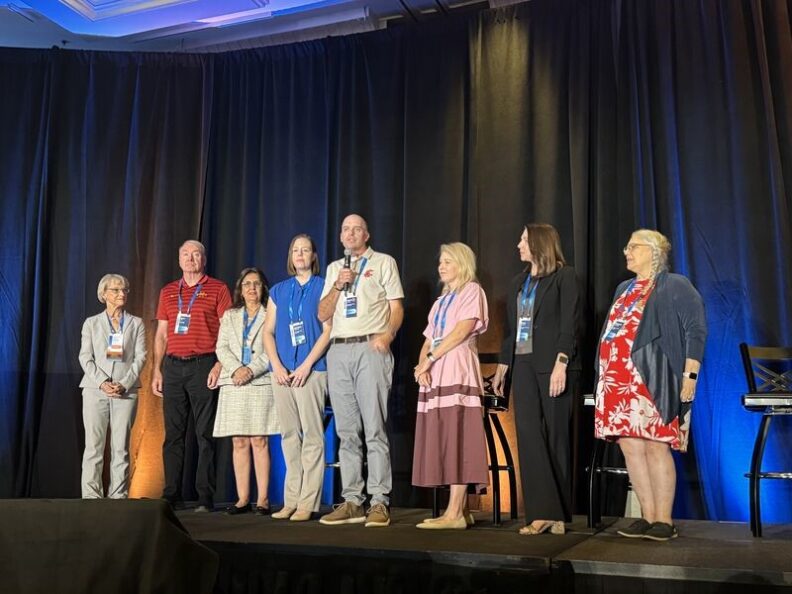 Gerik Kimble and Christine Galbreath join other Workday Higher Education award winners at the Workday Higher Education summit in Las Vegas, September 16, 2024.