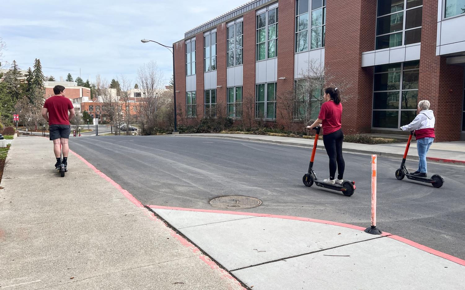 Students on Spin Scooters