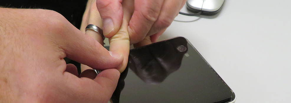 picture of someone being fingerprinted