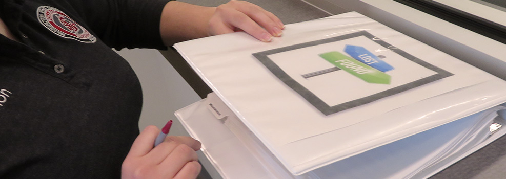 picture of a lost and found three ring binder