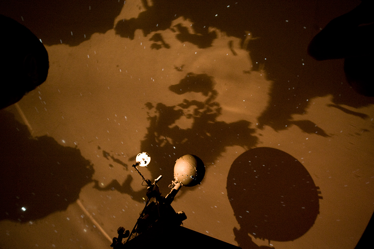 Image of the interior of the Planetarium, showing projections on the dome.