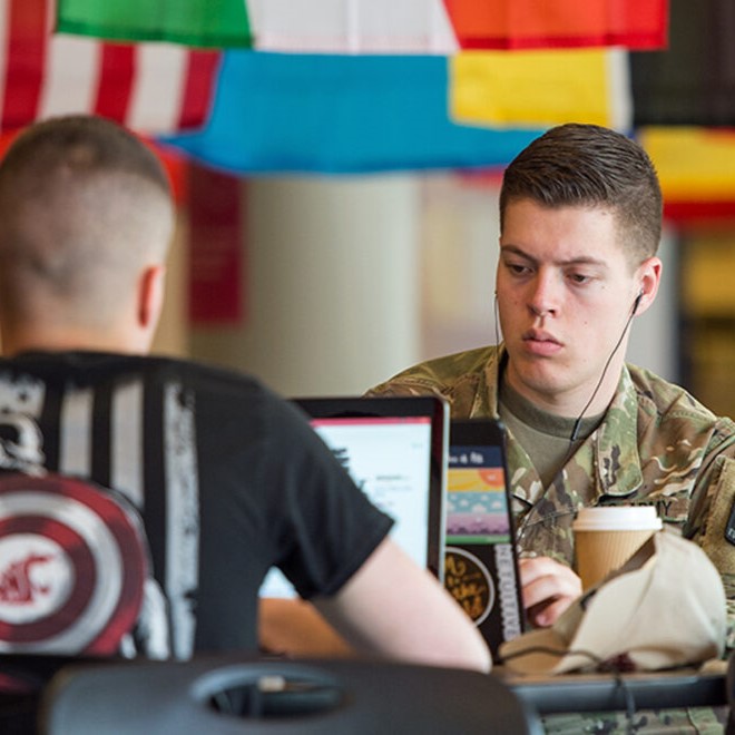 Two veteran WSU students study in the Compton Union Building during International Education Week