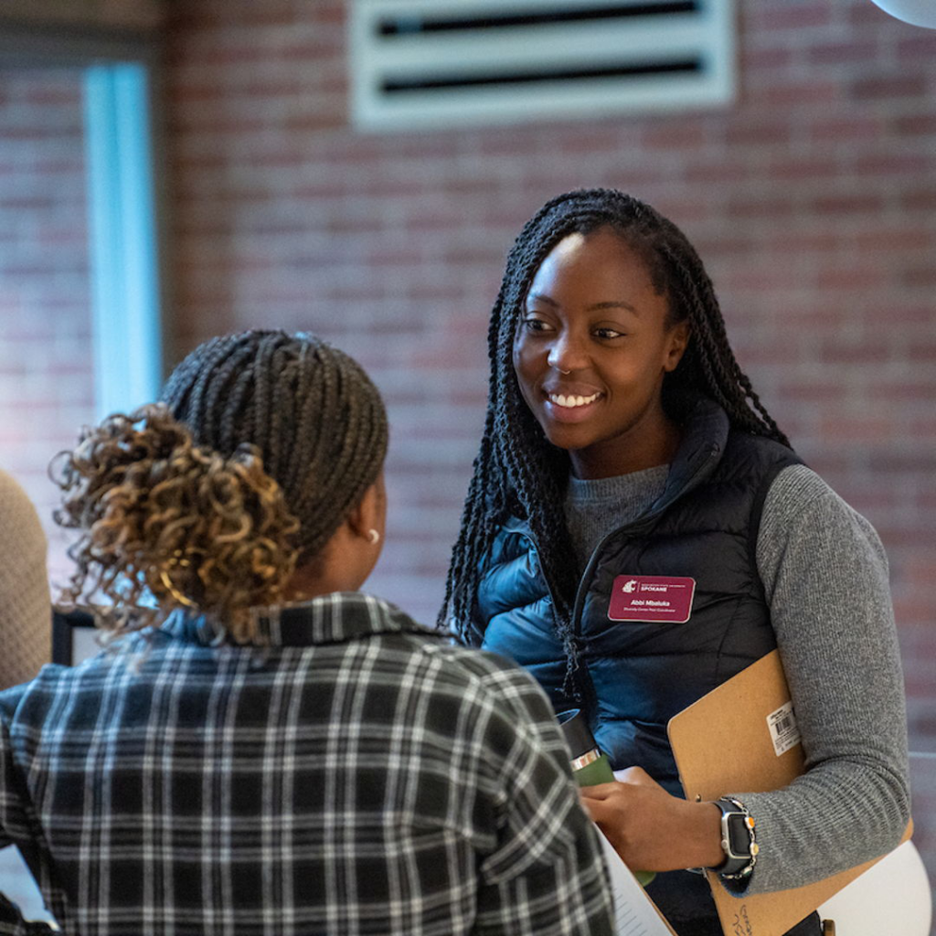 A student counselor assists a classmate at WSU Pullman.