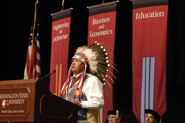 A tribal leader speaks at WSU commencement.