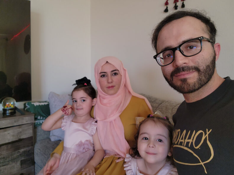Sebghatullah Noori is pictured with his family in their new apartment in Pullman. 