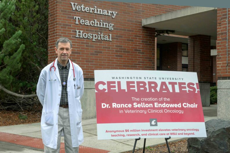Dr. Rance Sellon, a professor and veterinary oncologist at Washington State University's College of Veterinary Medicine, poses for a photo on Tuesday, Dec. 3, 2024, in front of the Veterinary Teaching Hospital in Pullman.