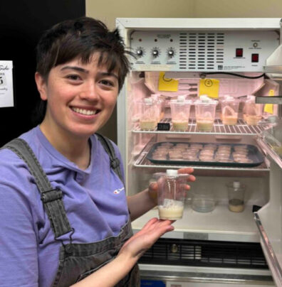 Gusta Beard at an Entomology freezer with specimens.