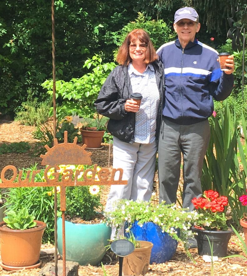 Gerry and Sandy Edwards enjoying time in their garden.