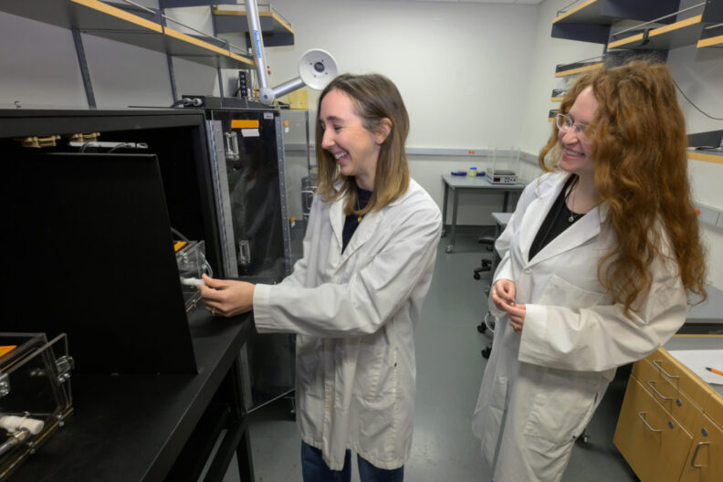 Katy Touretsky, right, a neuroscience major in Washington State University's College of Veterinary Medicine, talks with Kristen Delevich, left, an assistant professor in the department of Integrative Physiology & Neuroscience, on Tuesday, March 18, 2025, in Pullman. Touretsky is also an EschLEAD researcher and a Zornes scholar. (College of Veterinary Medicine/Ted S. Warren)