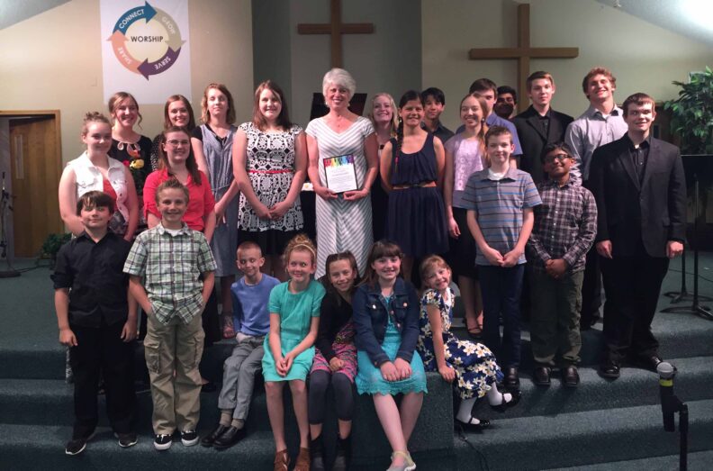 Mimi with many of her students for a 2016 spring recital in Puyallup.