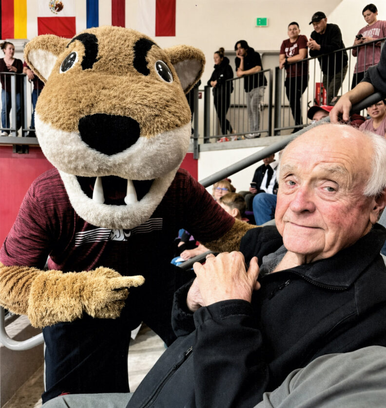 Butch T. Cougar and Stan in 2021 at a Coug basketball game.