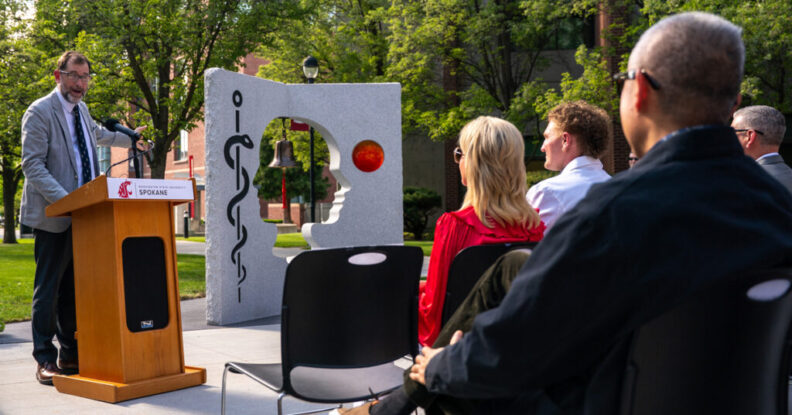 WSU Provost and Executive Vice President Chris Riley-Tillman addresses the crowd during a dedication ceremony on the Spokane campus (photo by Cori Kogan, WSU Spokane).