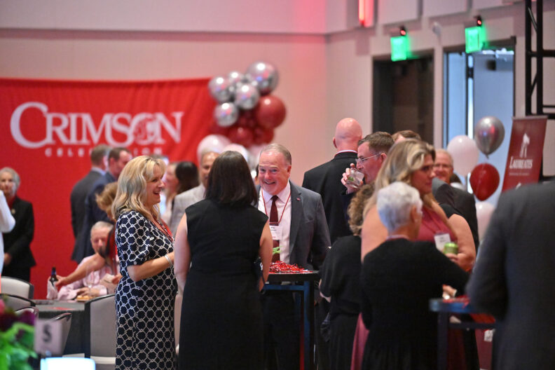 Mike Connell speaks to Cougs at the Crimson Celebration