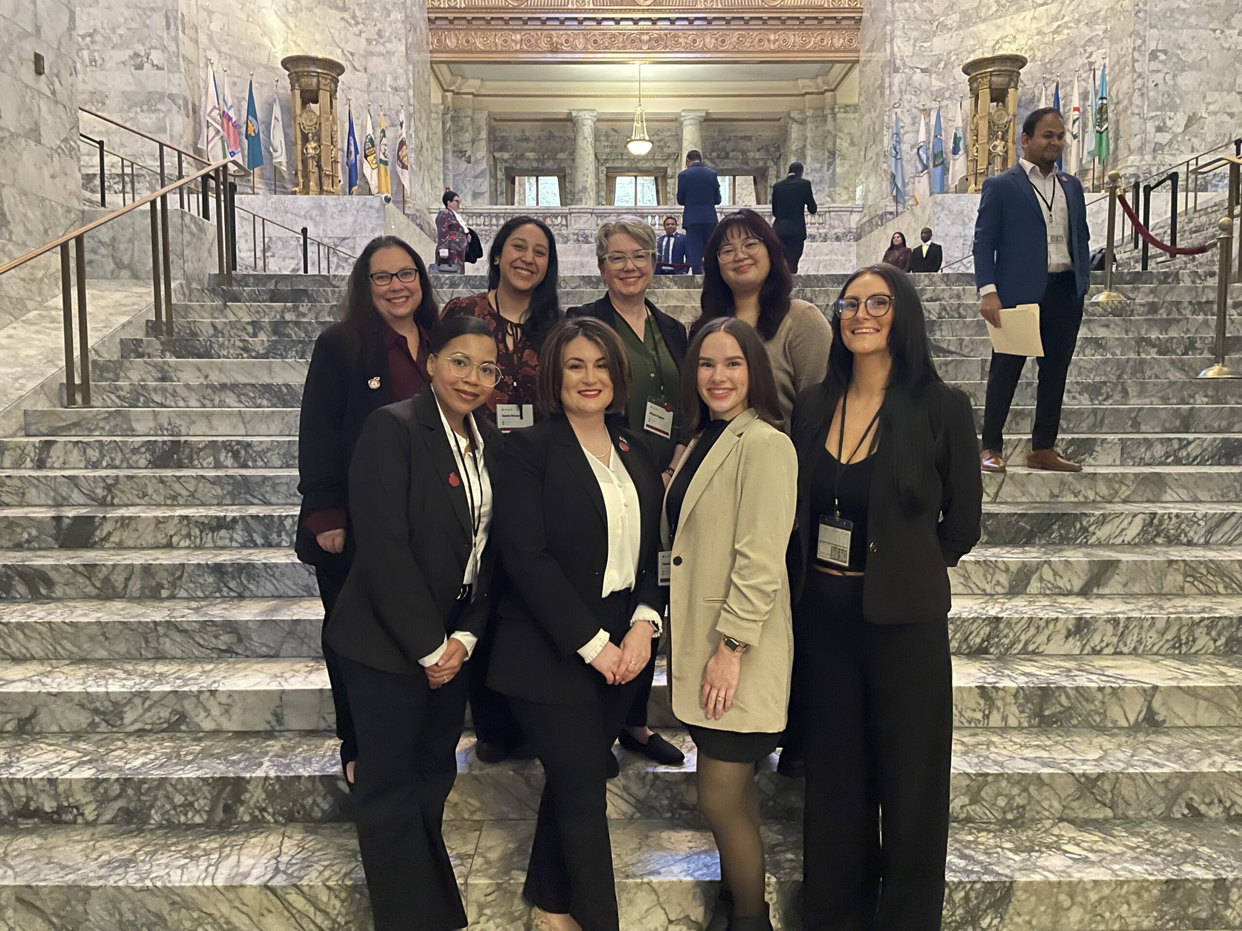 ASWSUG Executive Board and Global Campus students pose together on the steps of the Capitol during Coug Day at the Capitol.