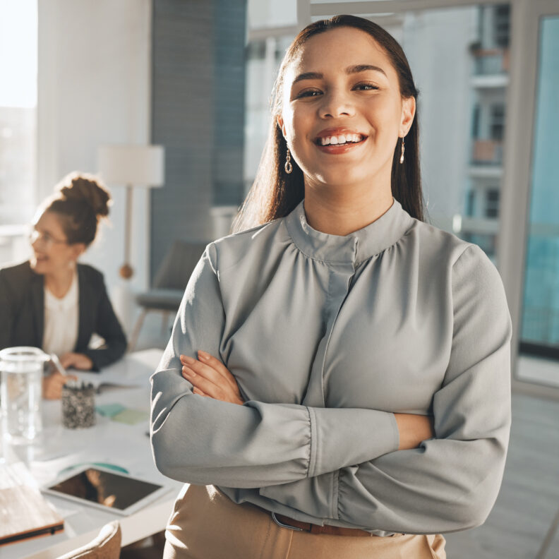 Photo of professional Woman standing with arms crossed