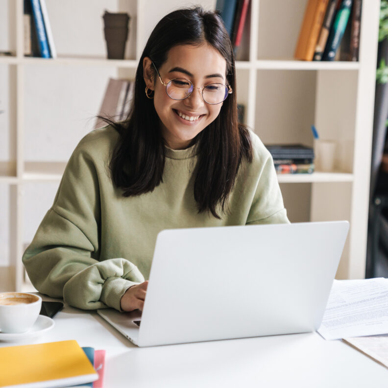 Happy Student on Laptop