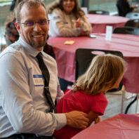 Untold Stories Event participant and child