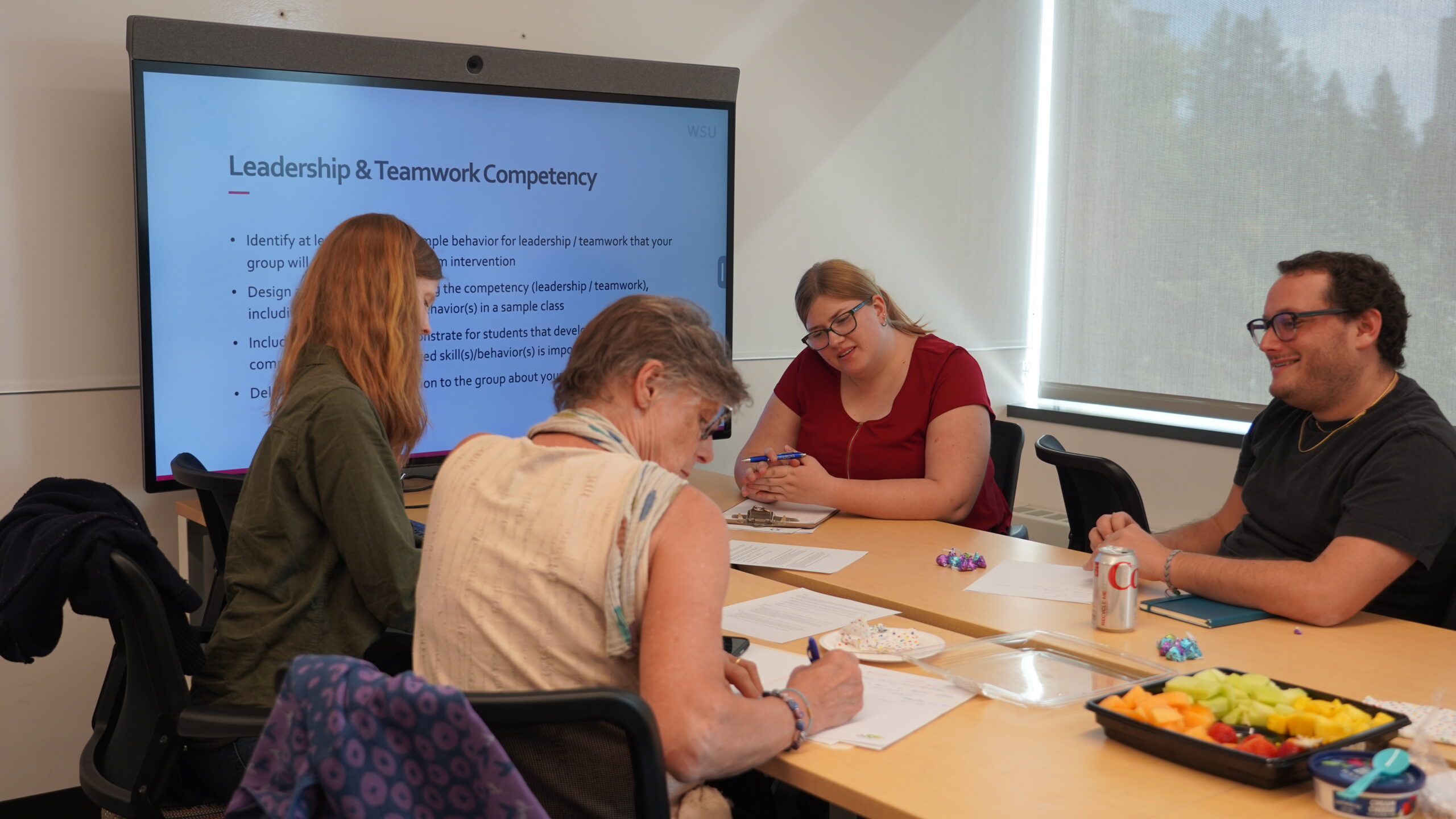 Participants of the core to career program working together on an assignment