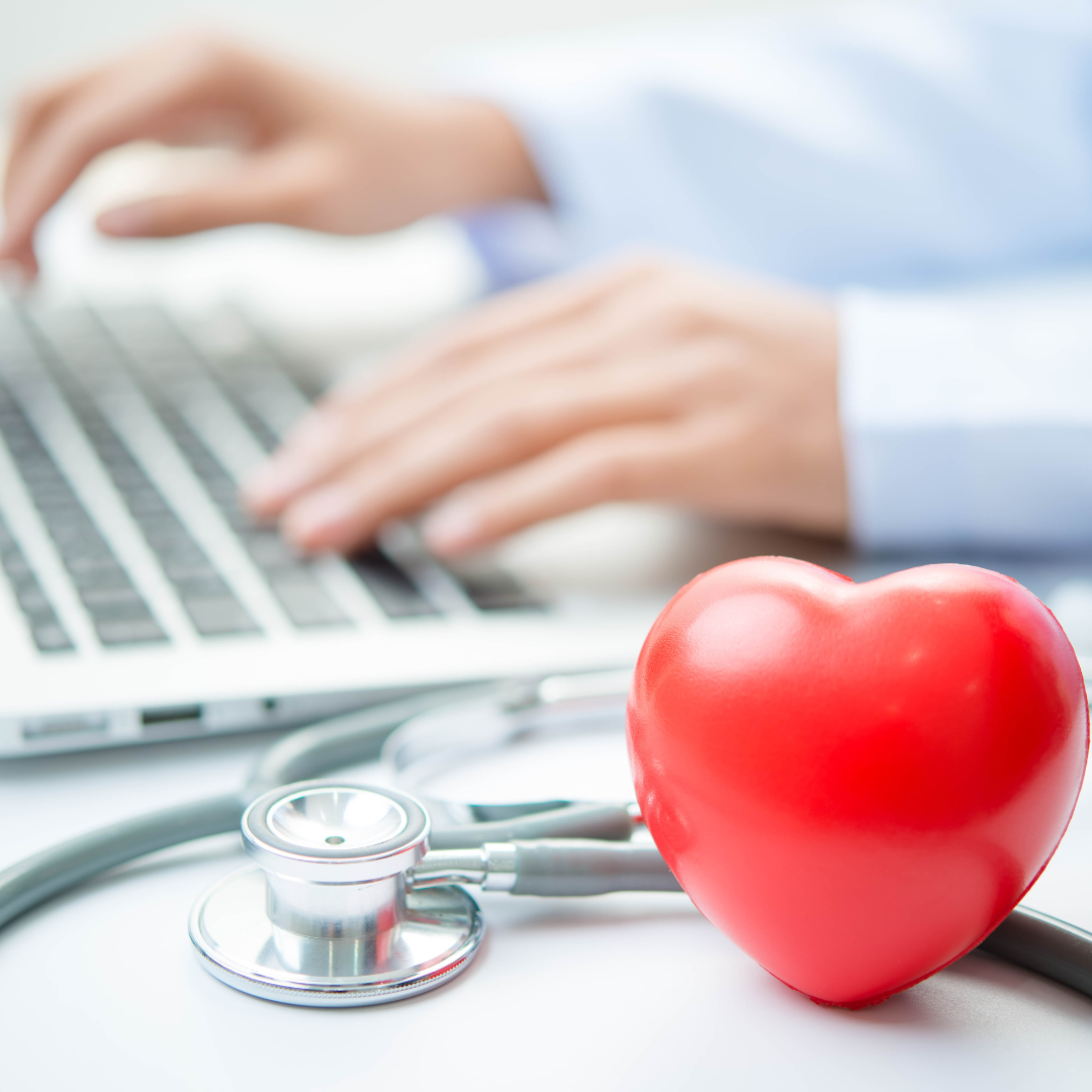 Heart, stethoscope and laptop