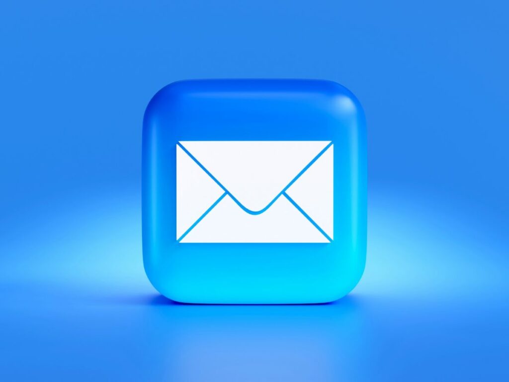 A blue, square button with a white email envelope icon, sitting on a blue background
