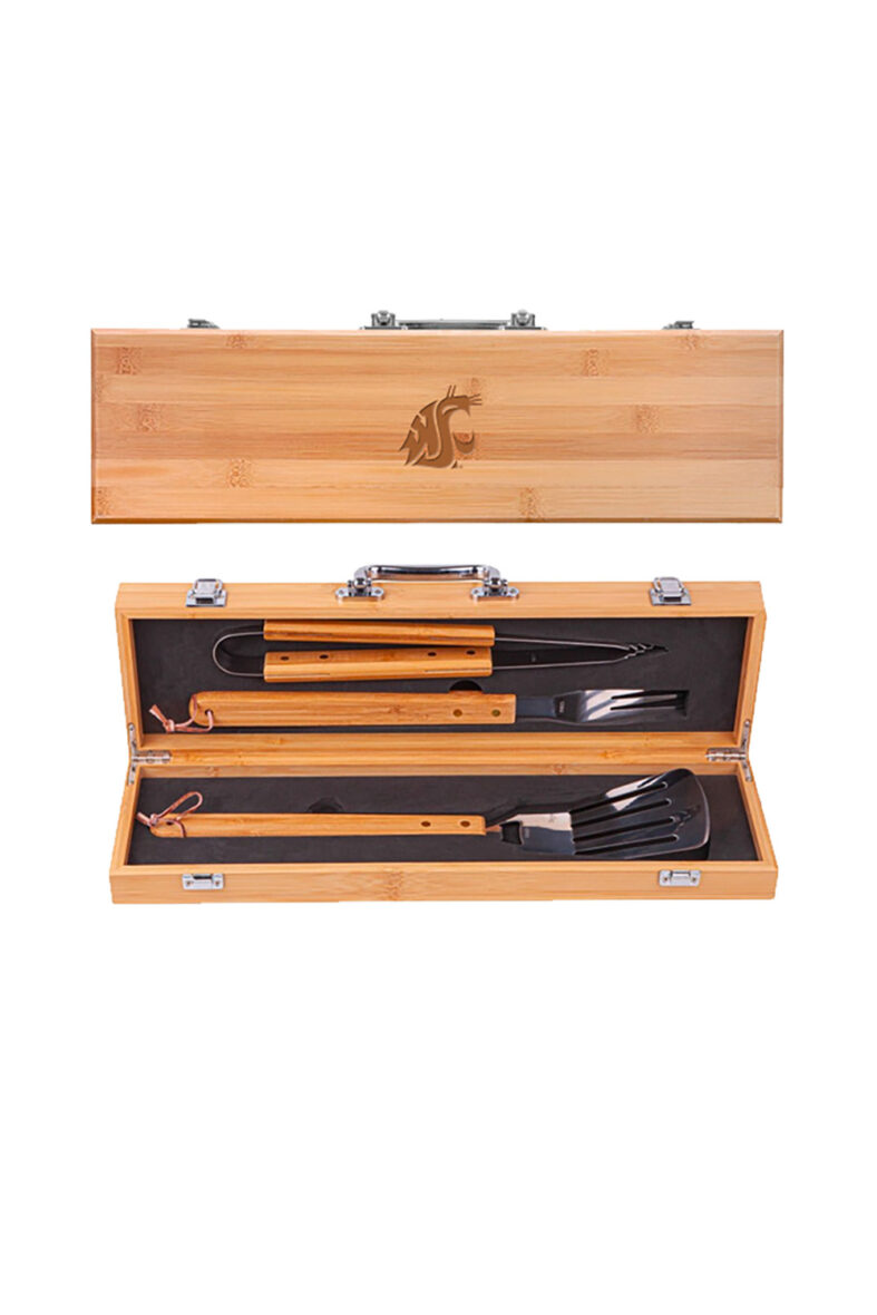 BBQ grilling tools with bamboo handles in a bamboo carry case with black interior and dark brown cougar head logo on the lid.