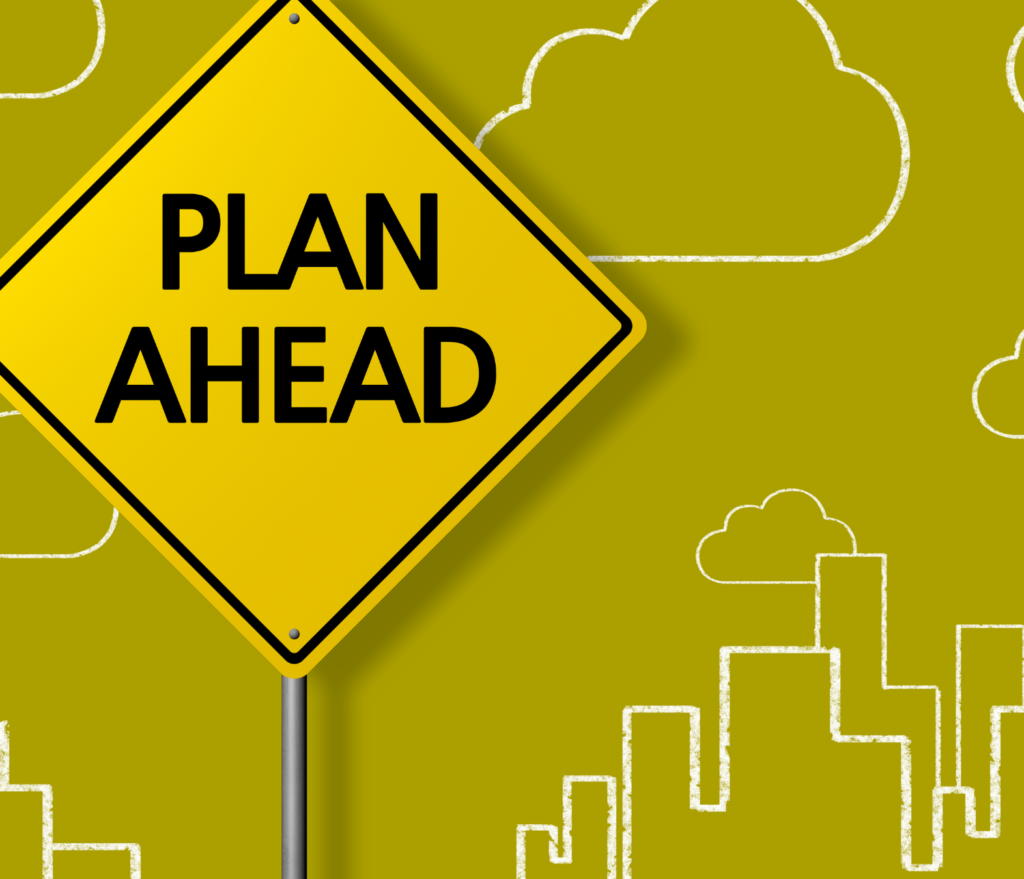 white outline of city skyline on green backgroud with a yellow caution sign saying "plan ahead"