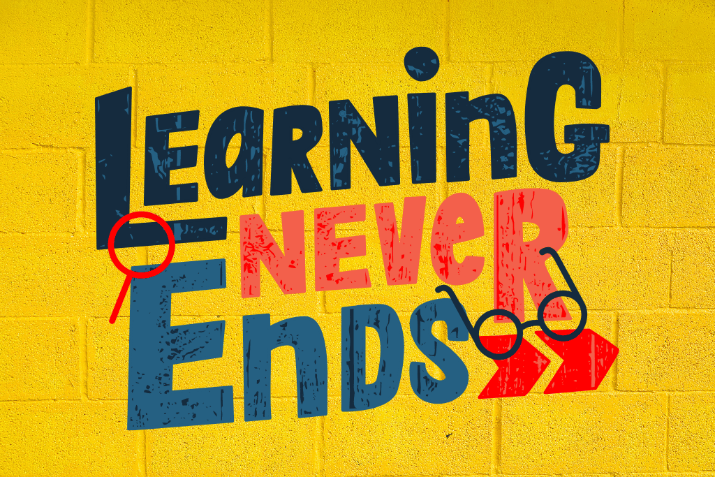 yellow brick wall with text: Learning Never Ends.