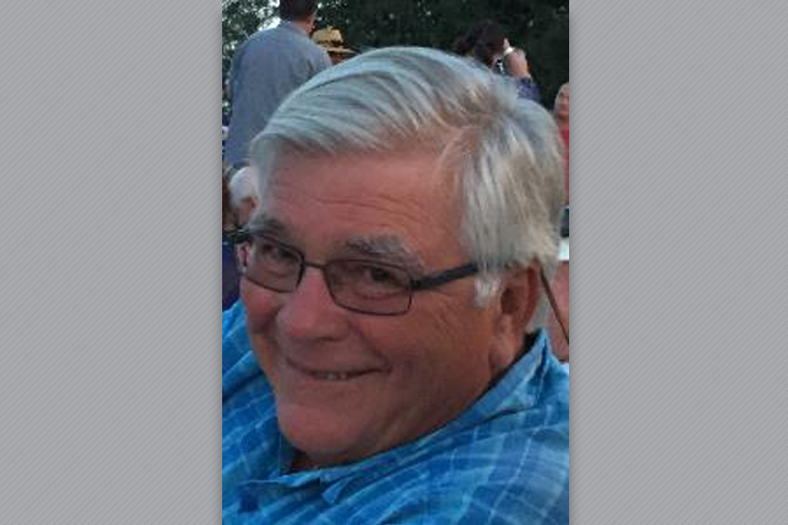 Dr. Gavin very happy at a social event.