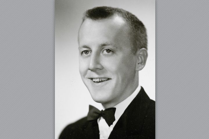 Black and white photo of Erland. He's wearing a black suit with a bow tie.