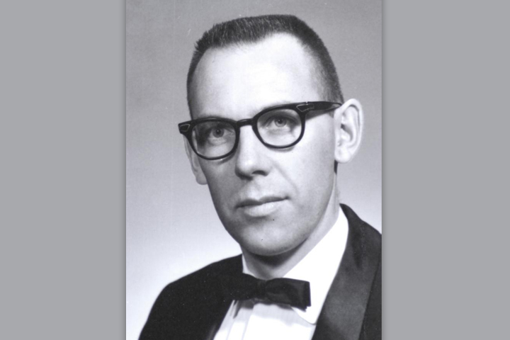 Hans as a DVM student in a suit with bowtie.