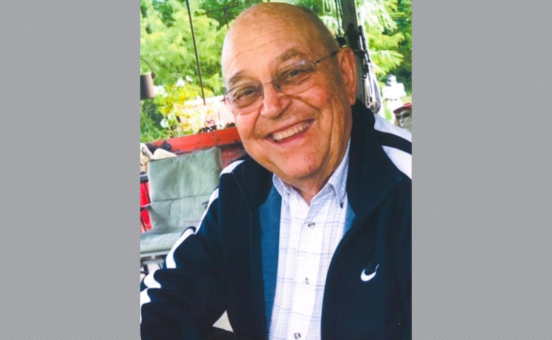 David Anderson sitting outdoors.