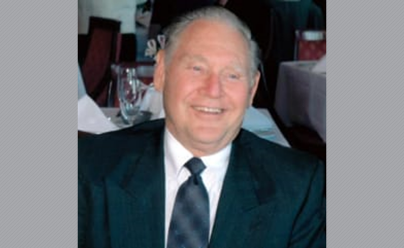 Photo of J. Irvine Bingham in suit and tie.