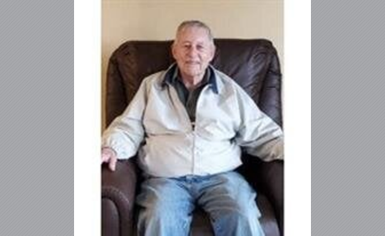 Marvin Dahlquist sitting in chair.